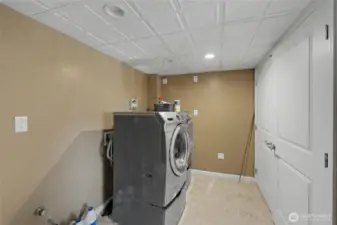 Laundry room in basement (washer and dryer stay)