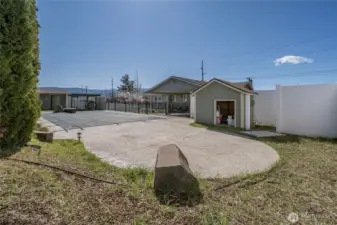 Pool, pump house and shed at far S end of pool area