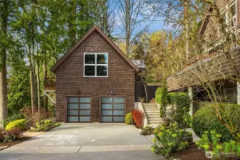 Two car garage with extra parking.