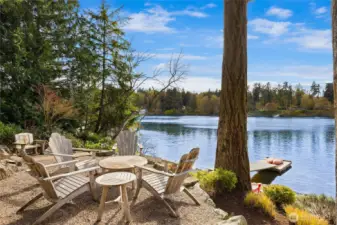 The property gently meanders to the shoreline with multiple sitting areas...