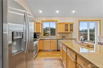 kitchen with large island and SS appliances