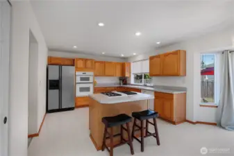 Spacious Kitchen, large enough for multiple people to move around in, and eat-in space if desired.