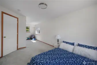 Bedroom #3 with access door. A small wall could easily be build separating the two halves and making a 4th Bedroom! Smaller room on other side could easily accomodate a twin bed or become a home office, playroom, craft room, the possibliilies are endless!