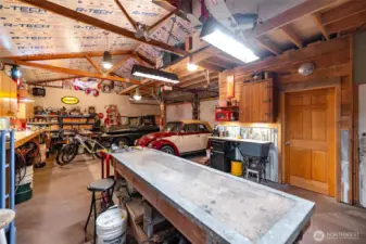 Bathroom is behind the door to the right.