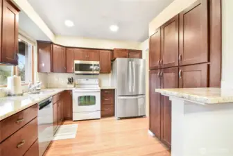Beautiful maple cabinets, granite counters, pantry!