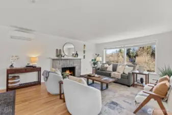 Bright, east-facing picture windows fill the home with natural light and showcase serene territorial views.