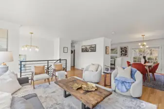 Spacious living area framed by west elm chandliers.