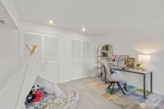 Don't miss the expansive storage behind the white doors!