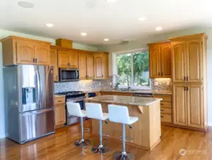 Eat in kitchen + Island Breakfast bar with all Stainless steel appliances