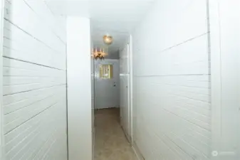 Hallway with storage goes to 3rd Bedroom and more