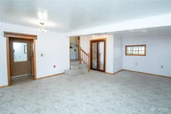 Furnace and storage behind closet doors - doorway to garage