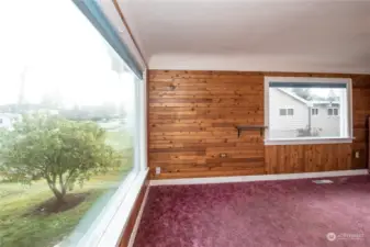 Large picture window at entry - HARDWOODS under the carpet