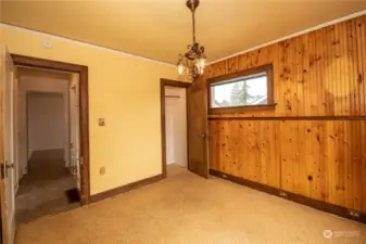 Primary bedroom - view to hall and walk in closet