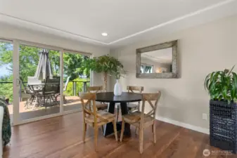 The dinning area, open to the living area and kitchen keeps everyone all together.