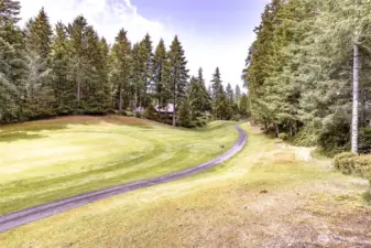 view from the yard to the 11th hole tee boxes.