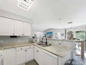 You'll love the gorgeous countertops in this lovely kitchen.