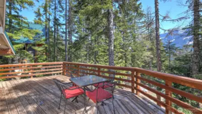 Enjoy spectacular views of Rampart Ridge and Chikamin Peak while you relax on the spacious deck.