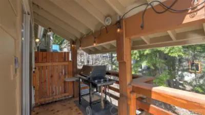 Covered BBQ area and propane gas hook-up for year-round enjoyment.