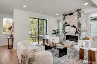 Welcoming living area on main level with covered deck.