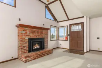 Cozy up next to the brick fireplace.