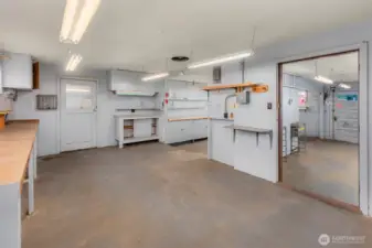 835 sq ft detached shop with power.