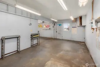 835 sq ft detached shop with power.