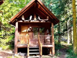 Sweet bunkhouse for your overnight guests. Includes a bedroom, half bath and loft