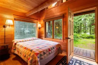 Check out the fun window over the bed. Owners call this the "Flamingo Room"