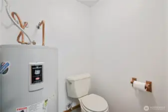 1/4 bath off laundry room on garage level