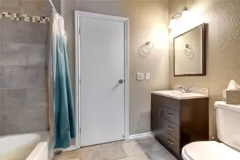 Main bathroom with 2 entrances. Door you see here is the hall door from living room.