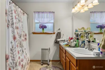 Primary bath includes double sinks and a soaking tub.