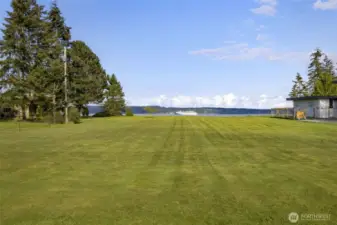A rare and ready opportunity—this level 1-acre parcel comes equipped with water, power, and a 3-bedroom septic system already in place. Imagine the home you can create here, perfectly positioned to take in the views and complement the existing residence across the road.