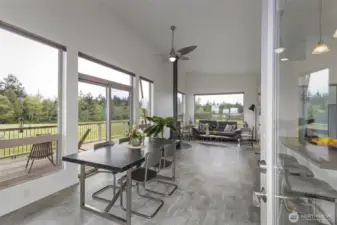Light and bright with seamless access to the covered upper deck creates the perfect setting for entertaining.