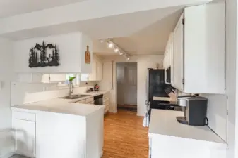 Functionally laid out kitchen with pass through counter.