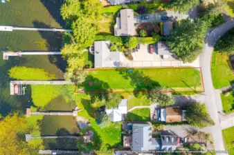 Don't miss the lake access lot, just across the street. Big grassy field and dock with multiple boat slips. This home includes partial ownership in the lakefront lot!