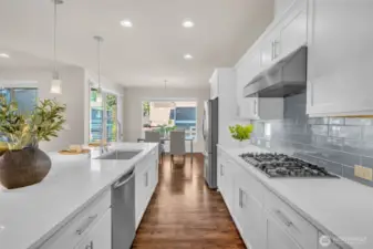 Grand kitchen with ample cabinet and counter space.
