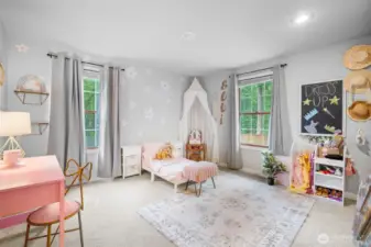 Charming and spacious bedroom, generous natural light, and plush carpeting—ideal for imaginative ideas and restful nights.