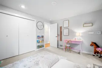 Delightful and airy bedroom featuring ample closet space
