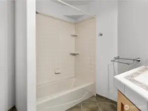 Upstairs bath with tile accents