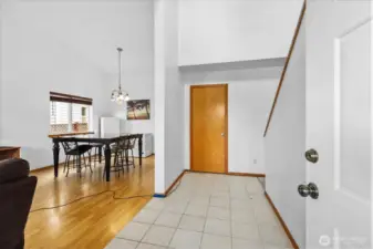 Bright open entryway with high ceilings.
