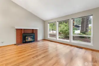 Main floor living room with gas fireplace