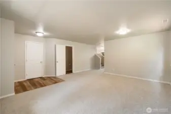 Another view of the living room.  Coat closet and power room in this picture.