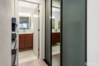 Second Closet looking into Primary Bathroom. Shoe Rack Located on Left