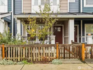 East facing with attached garage in back.