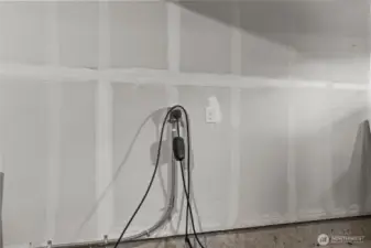 Recently installed Ev charger in the private, attached garage.