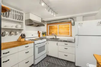 Lower level has its own kitchen, laundry, entrance.