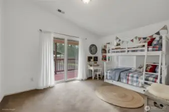 This is the bonus room adjoining the office area, it is virtually staged.