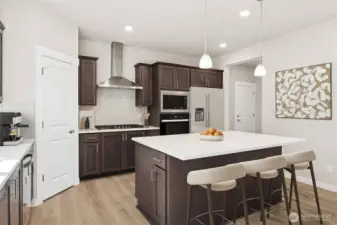 Enjoy gas cooktop. Photo's are for representational purposes only. Colors and finishes may differ.