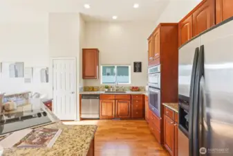 Features granite counters and stainless steel appliances for a modern, polished look.