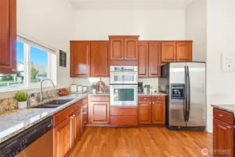 Hardwood flooring flows throughout for warmth and style.